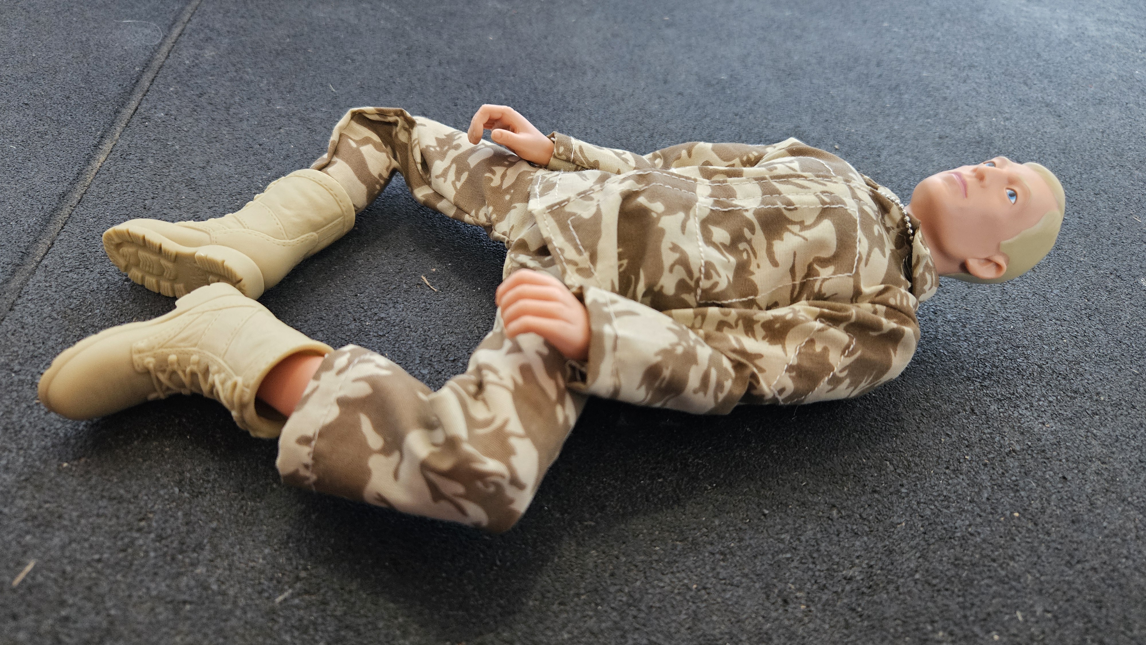 Action Man doing Reclined Butterfly Pose